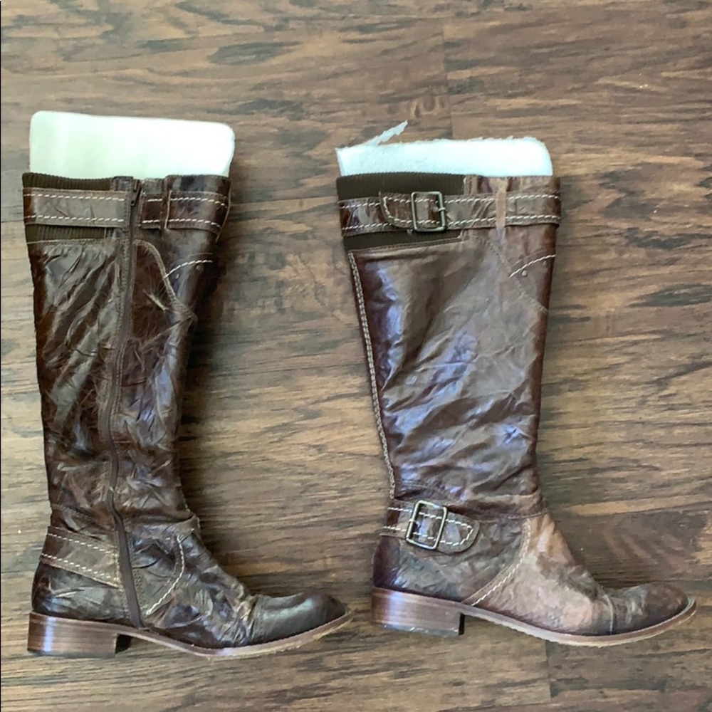 Boots. Runs a little small I typically wear size 8